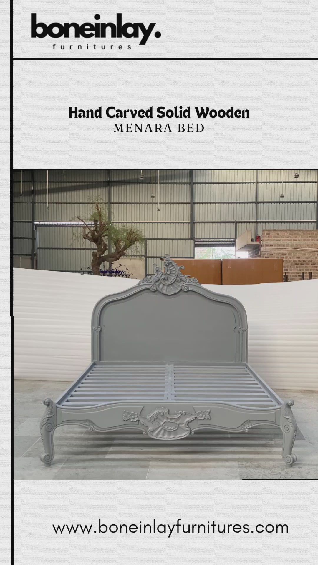 An advertisement video features a light gray, hand-carved solid wooden "Menara Bed" styled in classic French Rococo design with an ornate headboard, cabriole legs, and elaborate floral motifs. The video showcases the bed frame from various sweeping angles inside a manufacturing warehouse, transitioning to a collage of detailed close-ups highlighting the intricate craftsmanship. It concludes with a call-to-action screen displaying "Shop now," the website URL, and promotional benefits like free worldwide deli