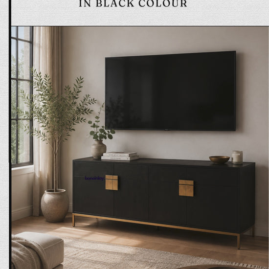 Modern black embossed metal sideboard buffet cabinet featuring sleek textured doors and square gold hardware. Designed as a stylish credenza and accent storage cabinet, this low-profile piece is displayed in a contemporary living room setting beneath a flat-screen TV, offering modern elegance and functional storage with premium brass-toned handles and slim metal legs.