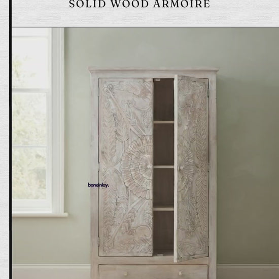 Farmhouse hand-carved white solid wood armoire with botanical design, double doors, and a bottom drawer