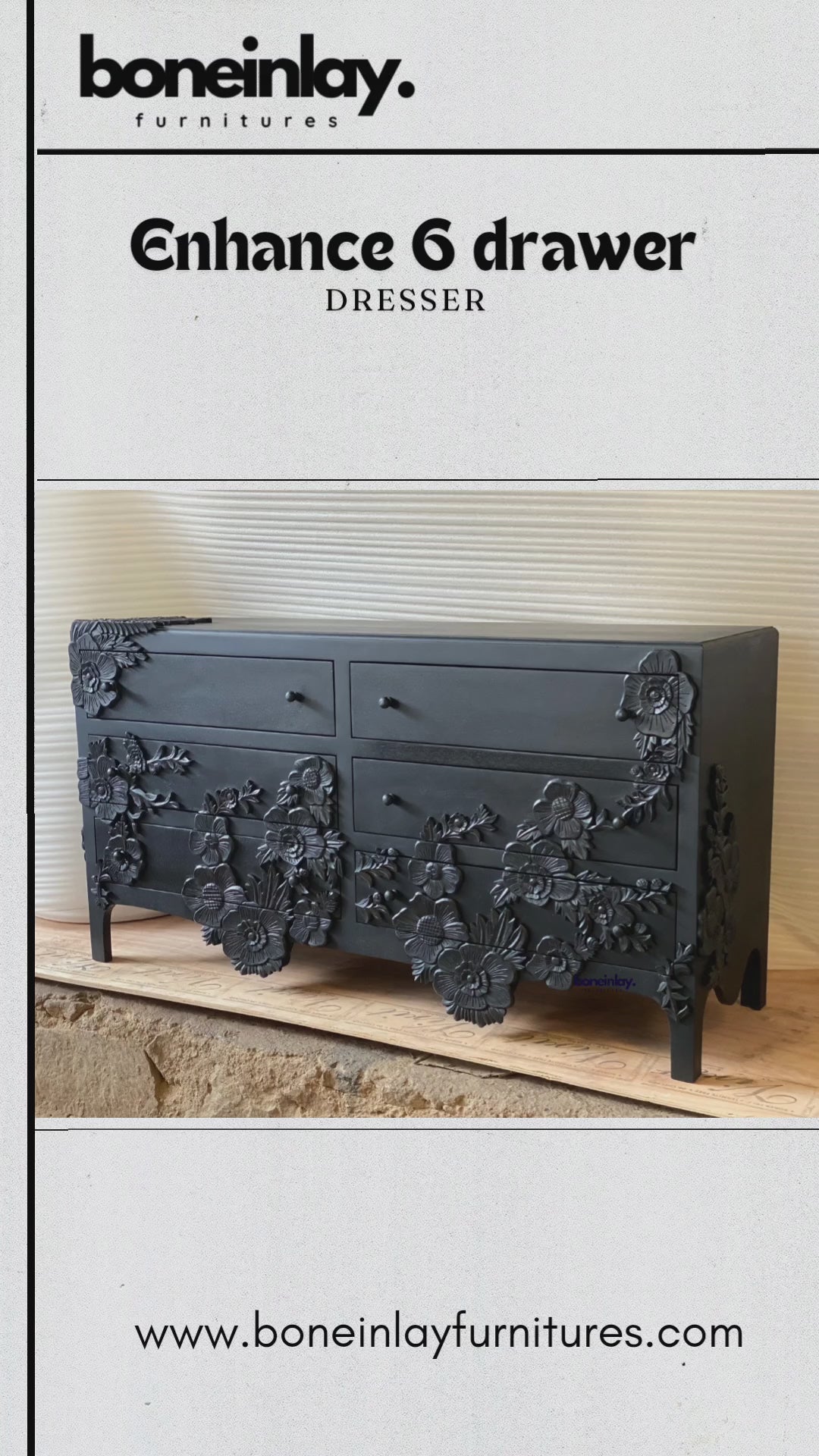 striking dresser is finished in a bold, matte black and is characterized by its high-relief, hand-carved floral appliqués. The 3D floral designs wrap around the corners and sprawl across the drawer fronts, creating a dramatic, textured silhouette.