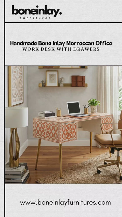 A promotional video showcasing a Handmade Bone Inlay Moroccan Office Work Desk with Drawers from boneinlayfurnitures.com. The desk features an intricate terracotta-orange and white geometric star pattern covering its exterior, supported by elegant gold hairpin legs. The video demonstrates the functionality of its two drawers by opening and closing them to reveal clean, spacious white interiors.