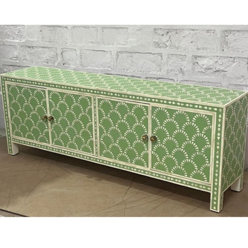 Shop our handcrafted sage green bone inlay sideboard. Featuring a unique scalloped fan design and 4 doors for luxury storage. Upgrade your home today!