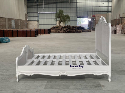 white french style cane bed