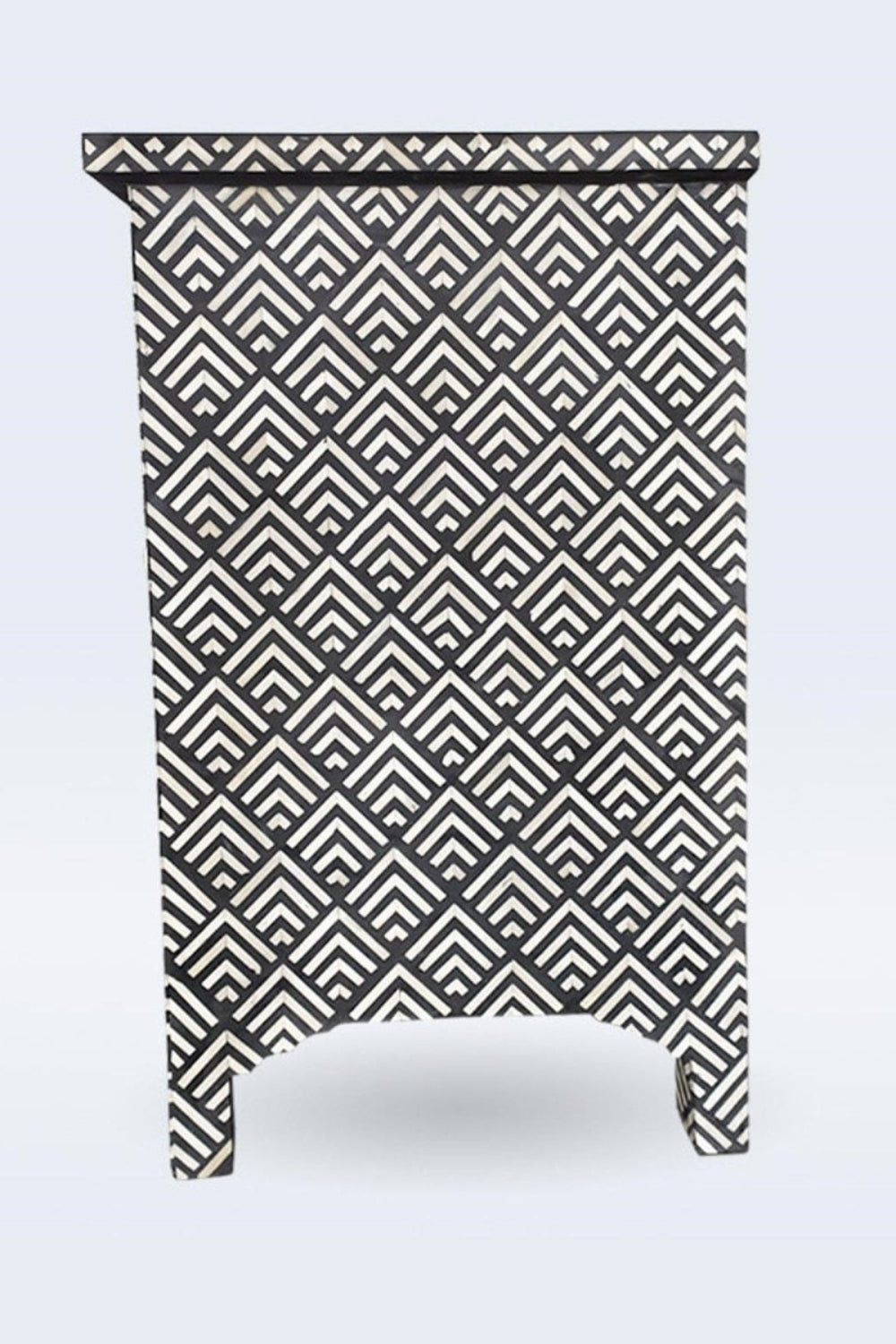 Black and ivory bone inlay chest of drawers shown in side profile, highlighting the stepped base and slim cabinet depth.