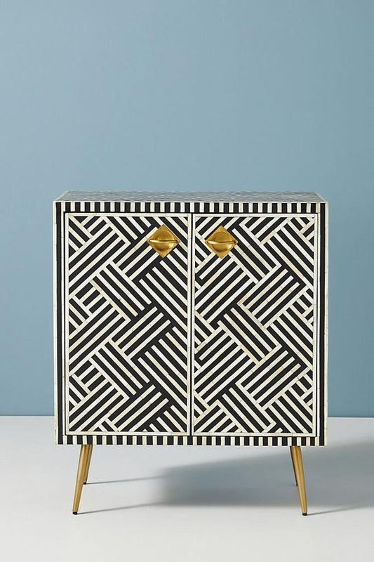 Black Bone Inlay Cabinet with an optical diagonal stripe pattern, gold diamond pulls, and tapered legs in a full front view.