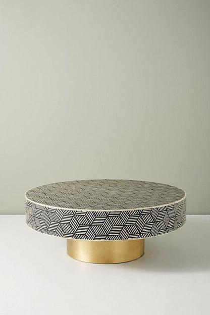 Black Bone Inlay Round Table with brass base, shown from the front with its patterned surface and circular design.