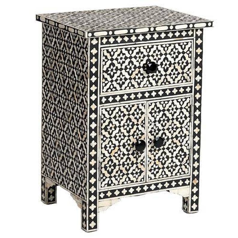Black and white bone inlay geometric nightstand with one drawer and two cabinet doors with black knobs on white background