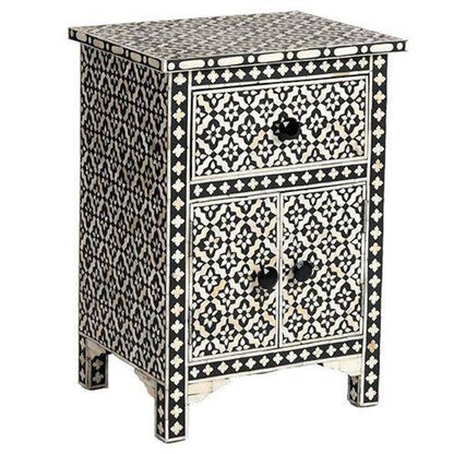 Black and white bone inlay geometric nightstand with one drawer and two cabinet doors with black knobs on white background