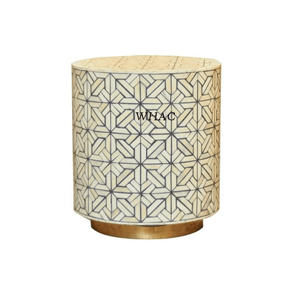 Bone inlay cylindrical end table featuring an all-over interlocking star pattern in ivory and charcoal on a brass plinth