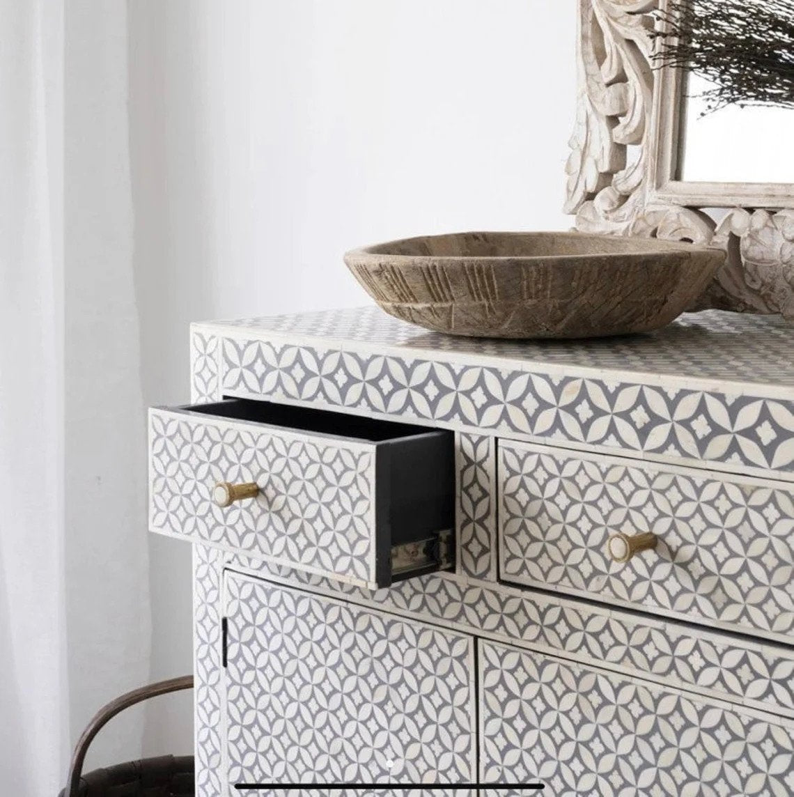 Bone inlay sideboard with open drawer showing deep storage, floral star geometric pattern in grey and white with brass knobs