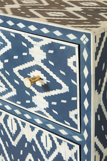 Indigo blue and ivory Ikat bone inlay entryway cabinet with one drawer, two doors, and a gold-finished metal base.
