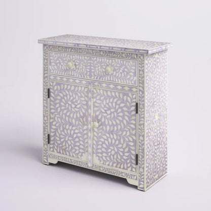 Bone inlay solid wood cabinet in lavender grey with all-over white leaf inlay, one drawer and two-door cupboard with bone knobs, shown on a plain white background with full cabinet detail.