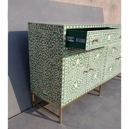 Bone inlay sage green credenza with one drawer open showing smooth interior and drawer slide mechanism with brass pull hardware