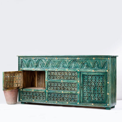 Brass Studded Carved Credenza in green wood, front view with the left door open to reveal a natural wood interior.