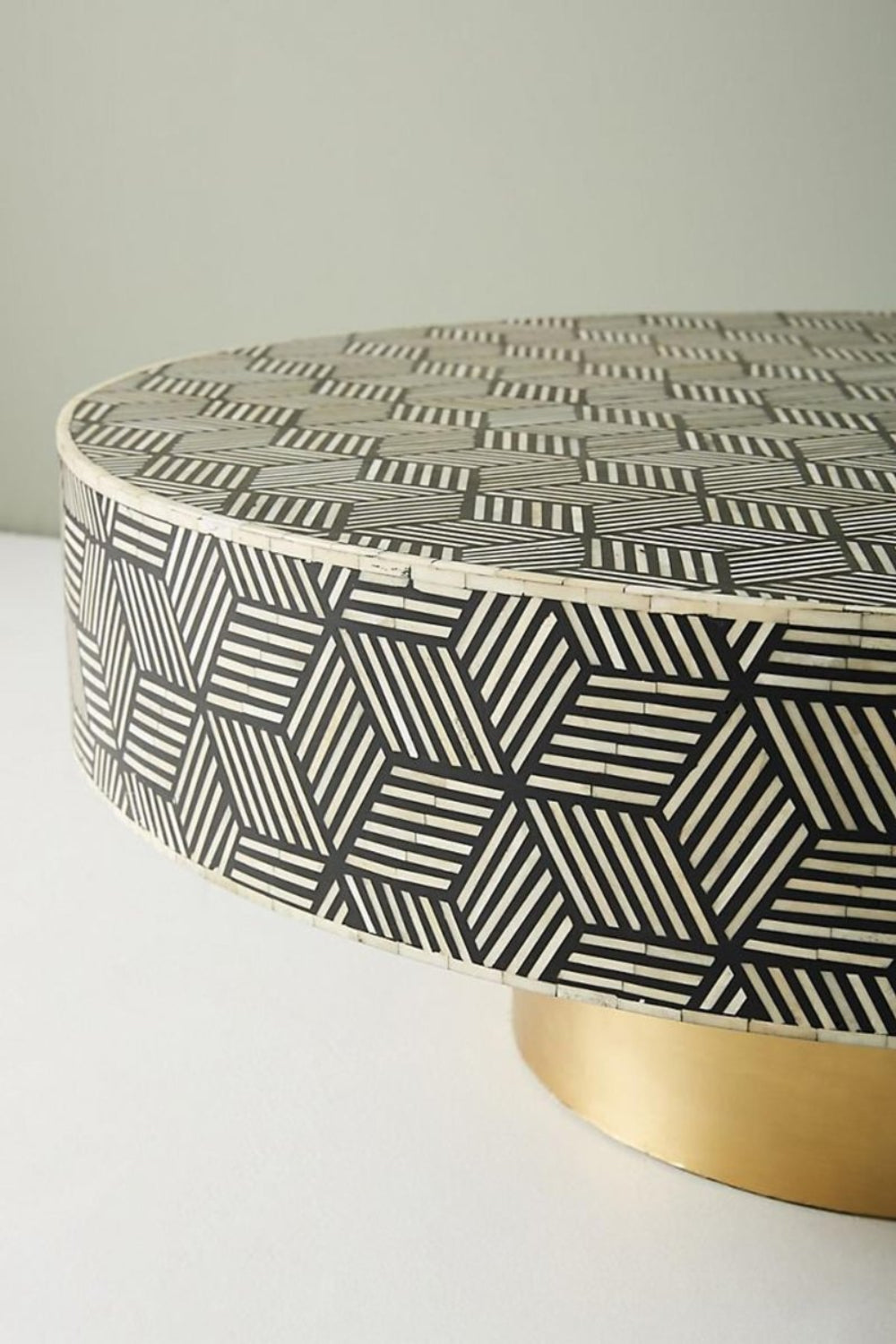 Geometric Black Occasional Table with bone inlay, shown in a close detail of the patterned tabletop surface.