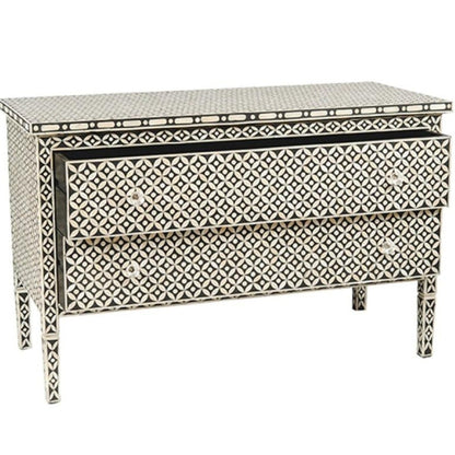 Geometric Bone Inlay Bureau, black and white pattern with two closed drawers on a clean white background, three-quarter view