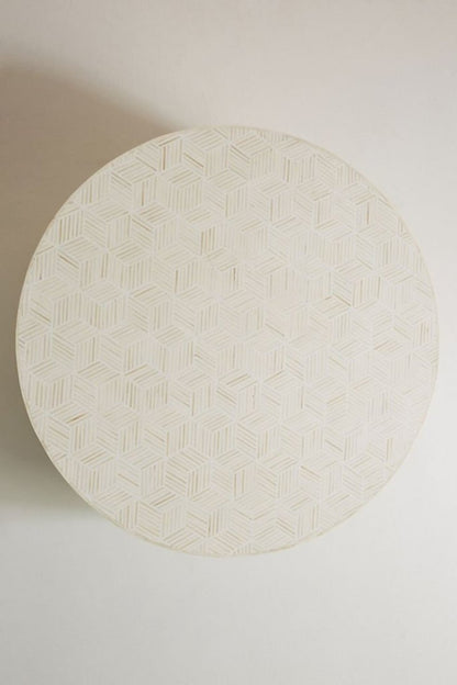 Geometric White Accent Table with bone inlay, captured from a top-down view showing the round patterned tabletop.
