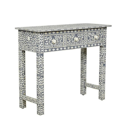 Grey and white bone inlay three drawer console table with floral vine inlay on drawers, legs, and tabletop, with flower-shaped bone drawer pulls on white background