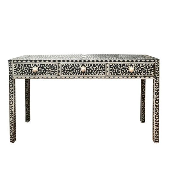 Handcrafted black bone inlay storage console table featuring white floral vine pattern across 3 drawers and legs, with bone flower-shaped knobs, white background.
