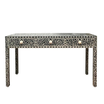 Handcrafted black bone inlay storage console table featuring white floral vine pattern across 3 drawers and legs, with bone flower-shaped knobs, white background.