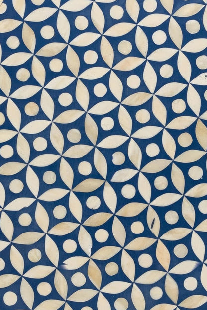 Top view of a blue and white bone inlay nightstand showing the patterned top surface, two-drawer layout, decorative floral knobs, and detailed handcrafted finish.