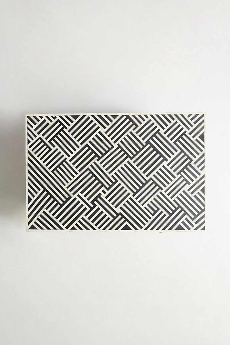 Optical bone inlay tabletop pattern in black and white, overhead top view showing the full geometric surface