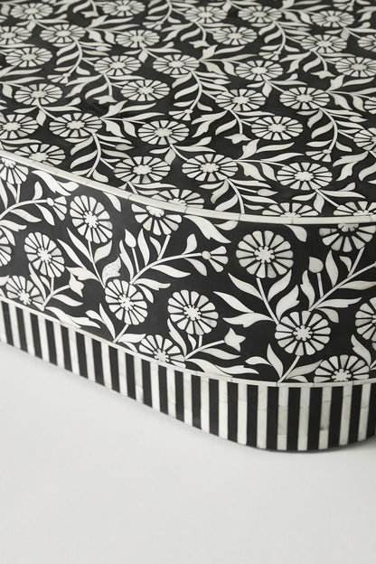 Handmade Bone Inlay Low Table in black and white, shown from a rear three-quarter view with the oval top and base visible.