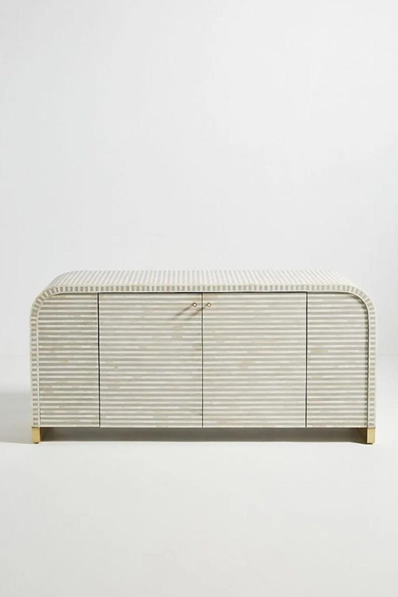 Front angle of a handmade grey bone inlay Waterfall buffet, showing the curved sideboard silhouette and horizontal bone inlay stripes across the cabinet face. The indoor storage piece is presented as a complete front-facing furniture view.
