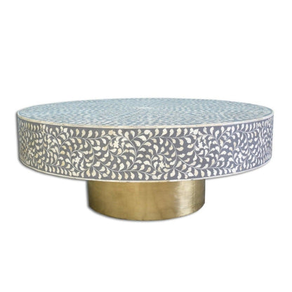 Slate grey and white bone inlay round coffee table with a floral vine pattern and gold metal pedestal base.