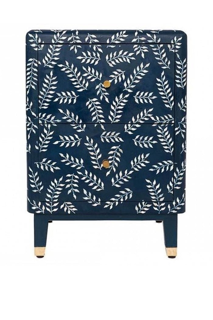 Leaf Vine Bedside Table in an angled front view, showing blue bone inlay, two drawers, curved edges, and brass-capped legs.