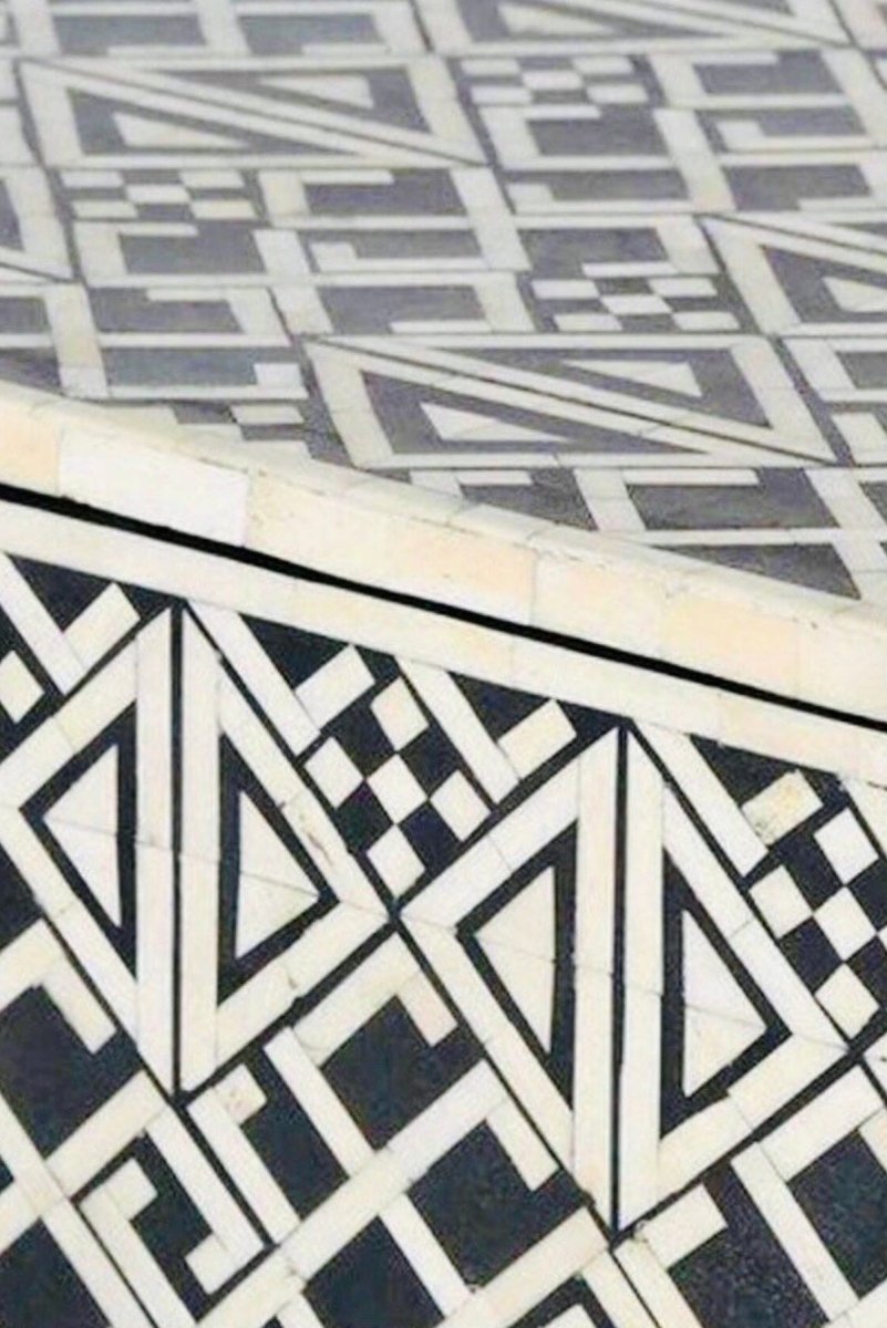 Monochrome Bone Inlay Server close-up showing the black and ivory geometric tile pattern with gold-toned hardware.