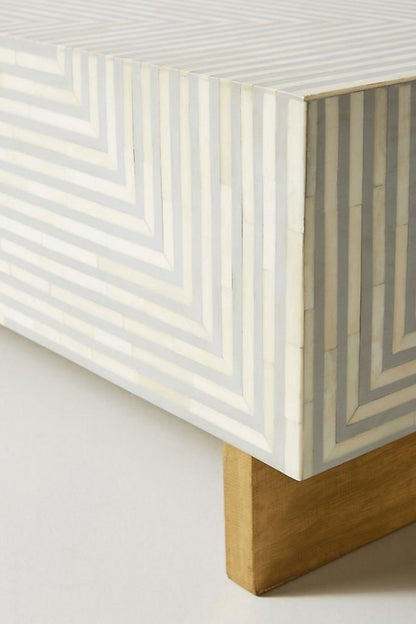 Optical Stripe Bone Inlay Low Table in white and grey, shown vertically with a close view of the patterned surface.