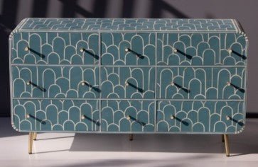 Seafoam bone inlay nine drawer storage dresser with scallop motif inlay and slender gold brass legs handmade in India
