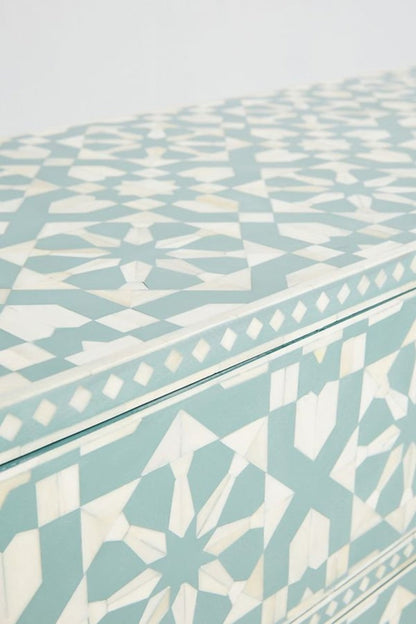 Slate green Moroccan bone inlay bureau, close-up shot showing the geometric inlay running across every drawer front