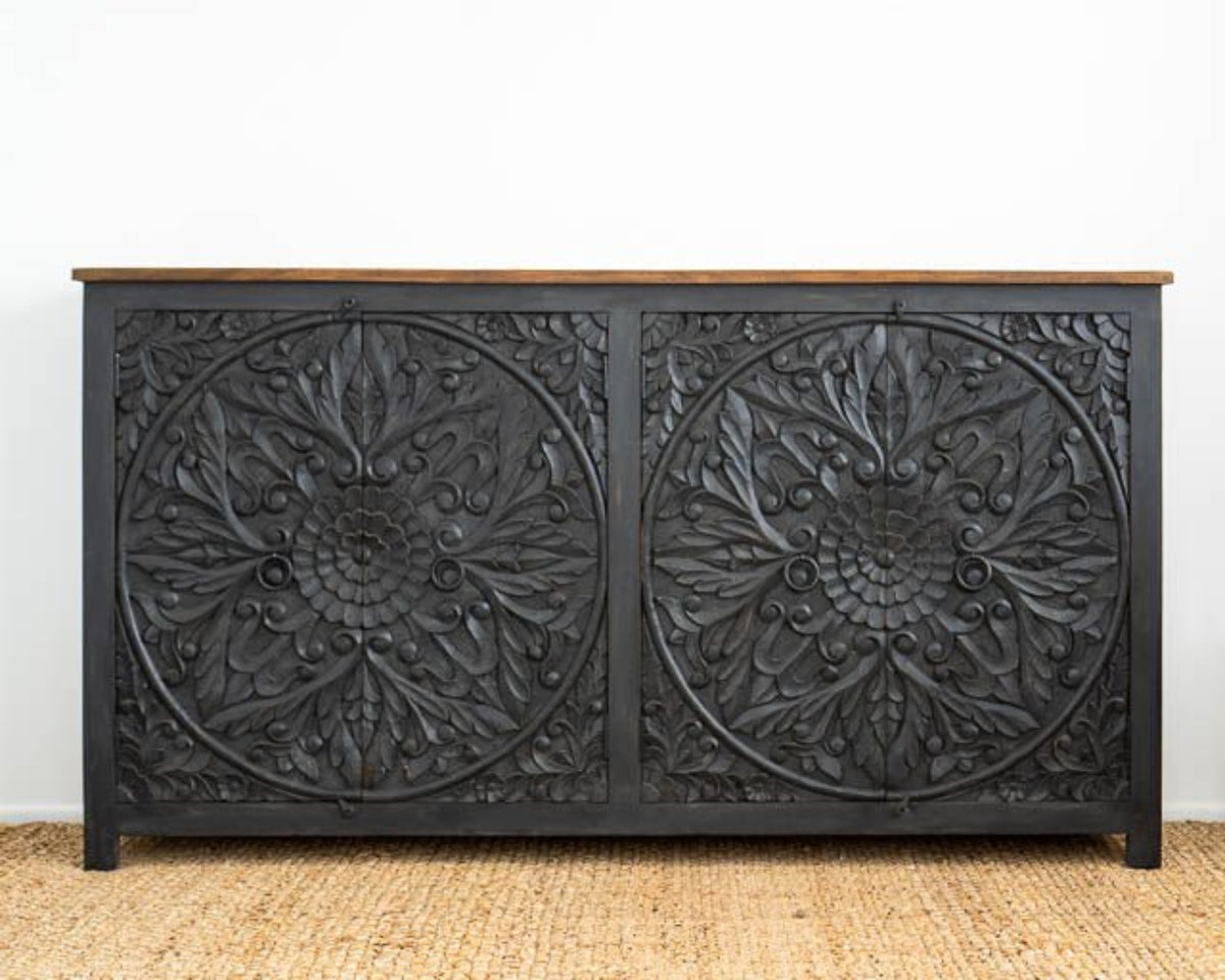 Traditional four Door Mandala Sideboard in black wood, shown in front view with two circular carvings and an undecorated top.