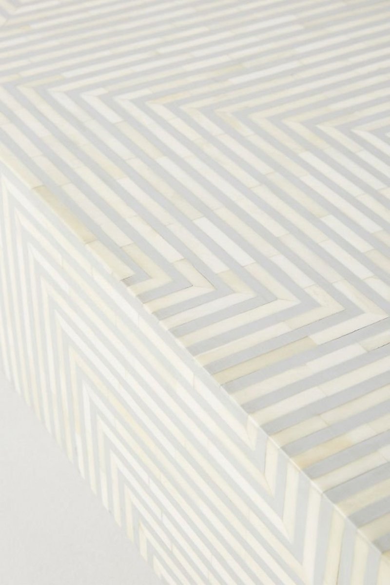 White Grey Bone Inlay Ottoman Table with striped detailing, shown vertically from an angled end and side view.