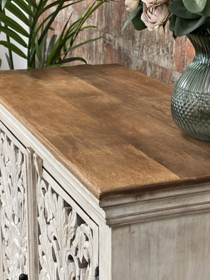 Wood top carved credenza with a rustic finish, corner detail view showing the natural wood grain and molded trim.