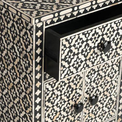 Open drawer detail of black and white bone inlay geometric bedside cabinet showing inlay pattern on drawer front and side panel