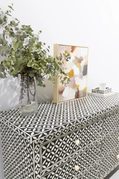 Bone inlay six drawer storage chest in black geometric design with decorative surface styling, handcrafted artisan dresser for living or bedroom