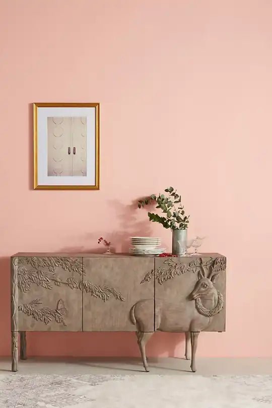 Artisan hand-carved land and sky buffet featuring a high-relief deer and forest scene across three doors with a taupe-grey finish.