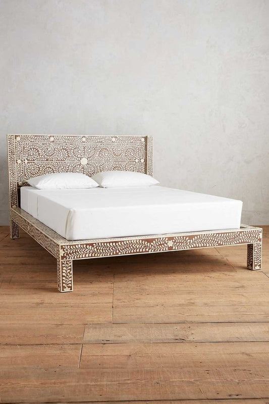 Side angle view of the Handmade Luxury Bone Inlay Platform Bed with Headboard, showcasing the hand-laid bone inlay floral pattern on the mango wood frame, a timeless piece of Rajasthani heritage craft.