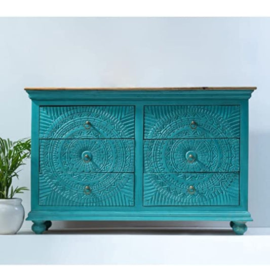 A 6-drawer solid wood dresser featuring hand-carved mandala patterns in a deep teal finish with a natural top and vintage-style ring pulls.